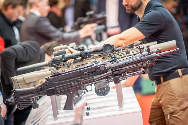 A view of the exhibition halls and the fairgrounds; the Heckler & Koch booth featuring handguns and machine guns; the Euro Defense Expo 2026 defense trade show in Essen, Germany; Essen, North Rhine-Westphalia, Germany; the fairgrounds