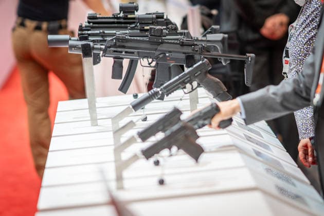A view of the exhibition halls and the fairgrounds; the Heckler & Koch booth featuring handguns and machine guns; the Euro Defense Expo 2026 defense trade show in Essen, Germany; Essen, North Rhine-Westphalia, Germany; the fairgrounds