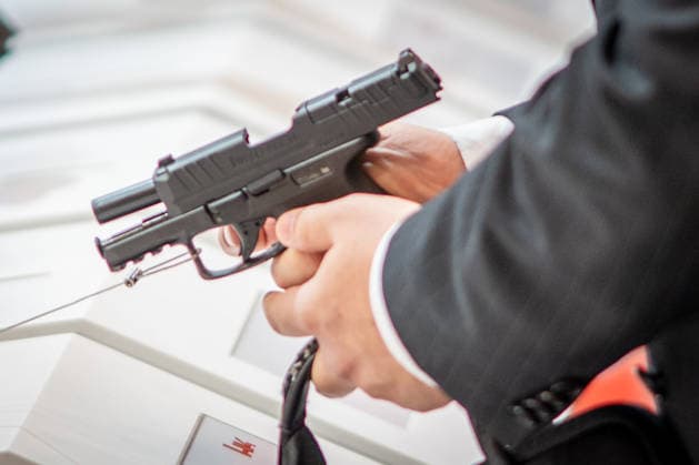 A view of the exhibition halls and the fairgrounds; the Heckler & Koch booth featuring handguns and machine guns; the Euro Defense Expo 2026 defense trade show in Essen, Germany; Essen, North Rhine-Westphalia, Germany; the fairgrounds