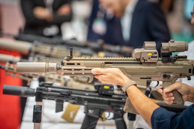 A view of the exhibition halls and the fairgrounds; the Heckler & Koch booth featuring handguns and machine guns; the Euro Defense Expo 2026 arms fair in Essen, Germany; Essen, North Rhine-Westphalia, Germany; the fairgrounds