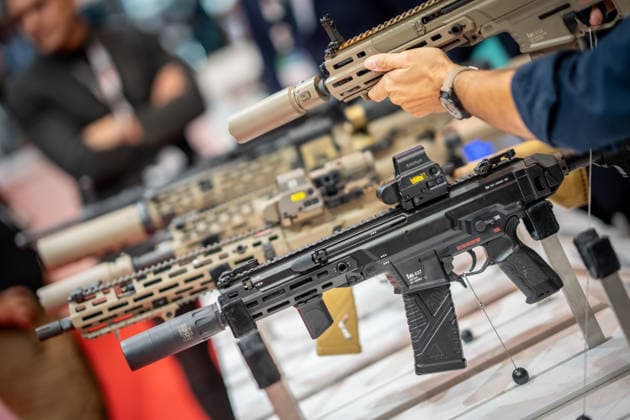 A view of the exhibition halls and the fairgrounds; the Heckler & Koch booth featuring handguns and machine guns; the Euro Defense Expo 2026 arms fair in Essen, Germany; Essen, North Rhine-Westphalia, Germany; the fairgrounds