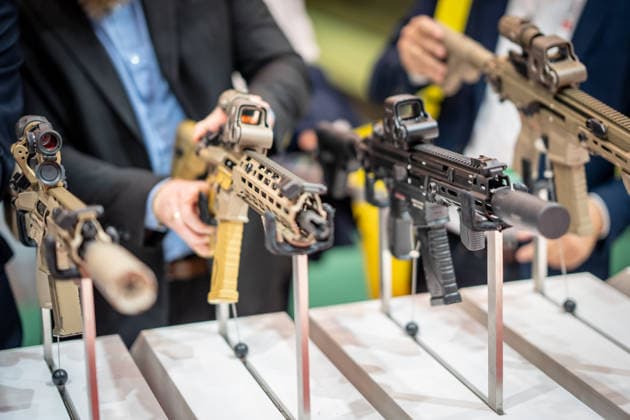 A view of the exhibition halls and the fairgrounds; the Heckler & Koch booth featuring handguns and machine guns; the Euro Defense Expo 2026 arms fair in Essen, Germany; Essen, North Rhine-Westphalia, Germany; the fairgrounds