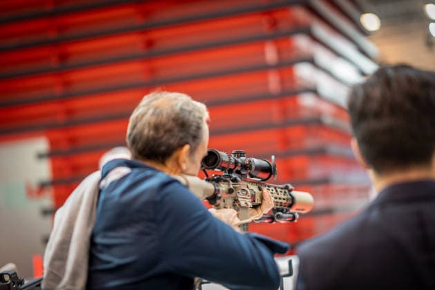 A view of the exhibition halls and the fairgrounds; the Heckler & Koch booth featuring handguns and machine guns; the Euro Defense Expo 2026 defense trade show in Essen, Germany; Essen, North Rhine-Westphalia, Germany; fairgrounds