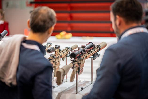 A view of the exhibition halls and the fairgrounds; the Heckler & Koch booth featuring handguns and machine guns; the Euro Defense Expo 2026 defense trade show in Essen, Germany; Essen, North Rhine-Westphalia, Germany; the fairgrounds