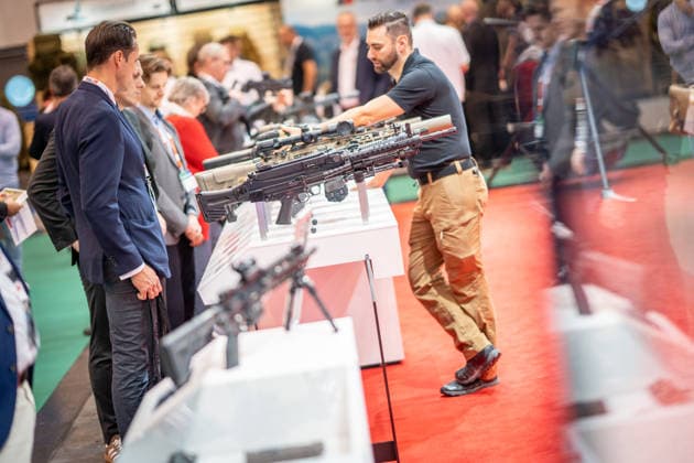 A view of the exhibition halls and the fairgrounds; the Heckler & Koch booth featuring handguns and machine guns; the Euro Defense Expo 2026 defense trade show in Essen, Germany; Essen, North Rhine-Westphalia, Germany; the fairgrounds