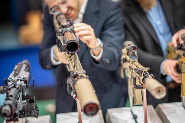 A view of the exhibition halls and the fairgrounds; the Heckler & Koch booth featuring handguns and machine guns; the Euro Defense Expo 2026 defense trade show in Essen, Germany; Essen, North Rhine-Westphalia, Germany; the fairgrounds