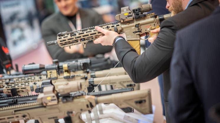 A view of the exhibition halls and the fairgrounds; the Heckler & Koch booth featuring handguns and machine guns; the Euro Defence Expo 2026 defense trade show in Essen, Germany; Essen, North Rhine-Westphalia, Germany; the fairgrounds