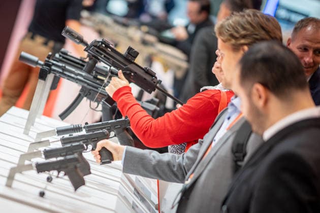 A view of the exhibition halls and the fairgrounds; the Heckler & Koch booth featuring handguns and machine guns; the Euro Defence Expo 2026 defense trade show in Essen, Germany; Essen, North Rhine-Westphalia, Germany; the fairgrounds