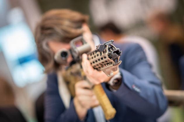 A view of the exhibition halls and the fairgrounds; the Heckler & Koch booth featuring handguns and machine guns; the Euro Defence Expo 2026 defense trade show in Essen, Germany; Essen, North Rhine-Westphalia, Germany; the fairgrounds