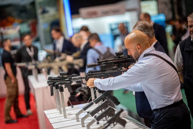 A view of the exhibition halls and the fairgrounds; the Heckler & Koch booth featuring handguns and machine guns; the Euro Defence Expo 2026 defense trade show in Essen, Germany; Essen, North Rhine-Westphalia, Germany; the fairgrounds
