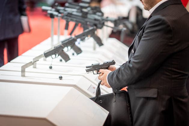 A view of the exhibition halls and the fairgrounds; the Heckler & Koch booth featuring handguns and machine guns; the Euro Defence Expo 2026 defense trade show in Essen, Germany; Essen, North Rhine-Westphalia, Germany; the fairgrounds