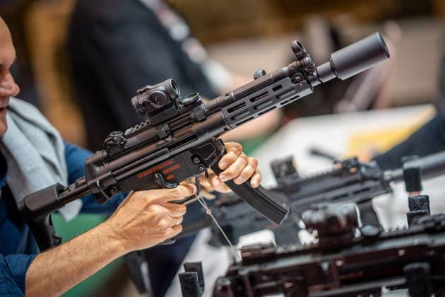 A view of the exhibition halls and the fairgrounds; the Heckler & Koch booth featuring handguns and machine guns; the Euro Defense Expo 2026 defense trade show in Essen, Germany; Essen, North Rhine-Westphalia, Germany; the fairgrounds