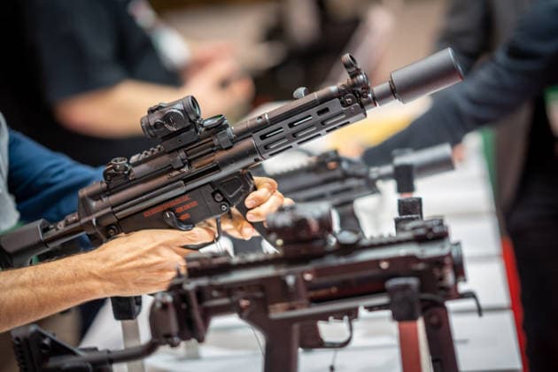 A view of the exhibition halls and the fairgrounds; the Heckler & Koch booth featuring handguns and machine guns; the Euro Defense Expo 2026 defense trade show in Essen, Germany; Essen, North Rhine-Westphalia, Germany; the fairgrounds