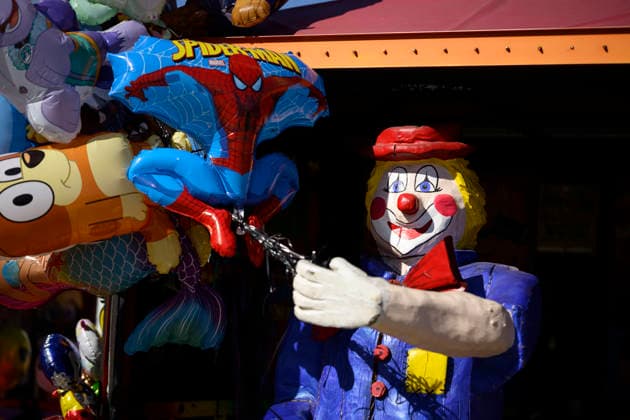 Papier-mâché clown with balloons at the Oidn Wiesn Oktoberfest, Munich, September 23, 2026