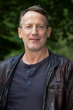 ABB TATORT Wotan Wilke Moehring, actor, on set for a photo shoot during the filming of the new NDR Tatort episode Schwere See at Falkensteiner Ufer in Hamburg on September 23, 2026, Hamburg, Germany