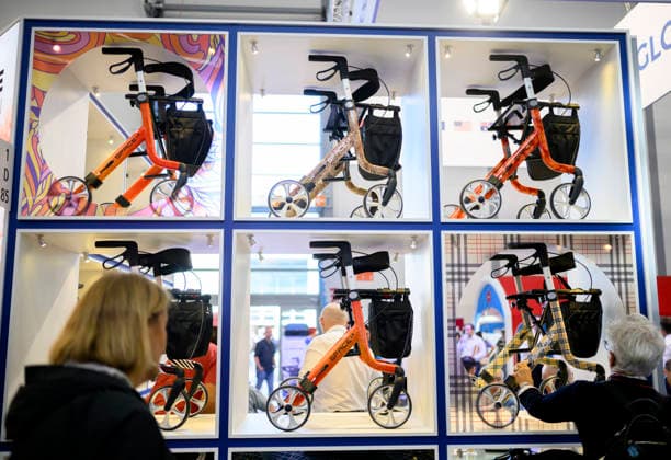 Feature: Visitors examine walkers at REHACARE, the trade fair for rehabilitation and care, September 23–26, 2026, in Düsseldorf, Germany