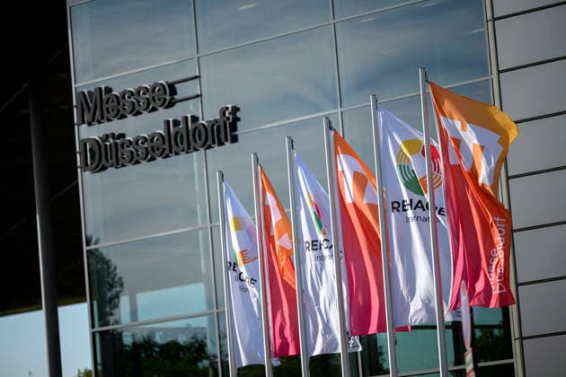 Feature: Banners and Flags in Front of the REHACARE Trade Fair for Rehabilitation and Care Exhibition Center, September 23–26, 2026, in Düsseldorf, Germany