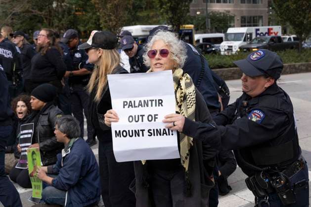 September 23, 2026, New York, New York, USA: Demonstrators are arrested by NYPD. ACT UP NY leads a coalition of organizations blockading the entrance to 1 WTC and later blocking traffic on the West Side Highway demonstrating under the banner AI OUT OF OUR HEALTHCARE! PALANTIR OUT OF MOUNT SINAI! as the Newsweek AI Health Summit is held inside the building and a keynote speaker is Dr. Brendan Carr, (not pictured) CEO of Mount Sinai. Part of the MONEY FOR AIDS and HEALTHCARE! NOT FOR ICE and WARFARE! ACT UP (AIDS Coalition To Unleash Power) campaign, demonstrators denounce Mount Sinai s contract with Palantir, a surveillance, data analytics and military tech company. Approximately 20 people are arrested. New York USA - ZUMAr174 20260923_znp_r174_043 Copyright: xGinaxMxRandazzox