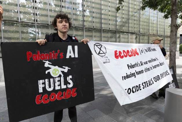 September 23, 2026, New York, New York, USA: ACT UP NY leads a coalition of organizations blockading the entrance to 1 WTC and later blocking traffic on the West Side Highway demonstrating under the banner AI OUT OF OUR HEALTHCARE! PALANTIR OUT OF MOUNT SINAI! as the Newsweek AI Health Summit is held inside the building and a keynote speaker is Dr. Brendan Carr, (not pictured) CEO of Mount Sinai. Approximately 20 protesters are arrested by NYPD. Part of the MONEY FOR AIDS and HEALTHCARE! NOT FOR ICE and WARFARE! ACT UP (AIDS Coalition To Unleash Power) campaign, demonstrators denounce Mount Sinai s contract with Palantir, a surveillance, data analytics and military tech company. Protesters hold banners that read Palantir s AI FUELS ECOCI - ZUMAr174 20260923_znp_r174_037 Copyright: xGinaxMxRandazzox