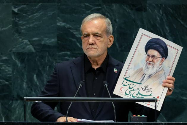 September 23, 2026, New York, United States: Iranian President Masoud Pezeshkian holds up a portrait of late Supreme Leader Ali Khamenei during his address to the 81st United Nations General Assembly at United Nations headquarters in New York City, United States, on September 23, 2026. Associated Press reported that Pezeshkian displayed a portrait of late Supreme Leader Ali Khamenei during the speech, along with photographs of schoolchildren killed in the opening days of the 2026 war. Khamenei was killed in Tehran on February 28, the opening day of the war. New York USA - ZUMAi98_ 20260923_zih_i98_015 Copyright: xIranianxPresidencyx