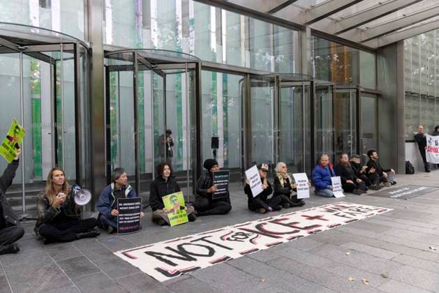 September 23, 2026, New York, New York, USA: ACT UP NY leads a coalition of organizations blockading the entrance to 1 WTC and later blocking traffic on the West Side Highway demonstrating under the banner AI OUT OF OUR HEALTHCARE! PALANTIR OUT OF MOUNT SINAI! as the Newsweek AI Health Summit is held inside the building and a keynote speaker is Dr. Brendan Carr, (not pictured) CEO of Mount Sinai. Approximately 20 protesters are arrested by NYPD. Part of the MONEY FOR AIDS and HEALTHCARE! NOT FOR ICE and WARFARE! ACT UP (AIDS Coalition To Unleash Power) campaign, demonstrators denounce Mount Sinai s contract with Palantir, a surveillance, data analytics and military tech company. New York USA  - ZUMAr174 20260923_znp_r174_018 Copyright: xGinaxMxRandazzox