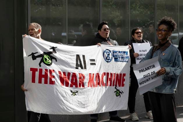 September 23, 2026, New York, New York, USA: ACT UP NY leads a coalition of organizations blockading the entrance to 1 WTC and later blocking traffic on the West Side Highway demonstrating under the banner AI OUT OF OUR HEALTHCARE! PALANTIR OUT OF MOUNT SINAI! as the Newsweek AI Health Summit is held inside the building and a keynote speaker is Dr. Brendan Carr, (not pictured) CEO of Mount Sinai. Approximately 20 protesters are arrested by NYPD. Part of the MONEY FOR AIDS and HEALTHCARE! NOT FOR ICE and WARFARE! ACT UP (AIDS Coalition To Unleash Power) campaign, demonstrators denounce Mount Sinai s contract with Palantir, a surveillance, data analytics and military tech company. Protesters chant and hold banners and signs that read AI TH  - ZUMAr174 20260923_znp_r174_022 Copyright: xGinaxMxRandazzox