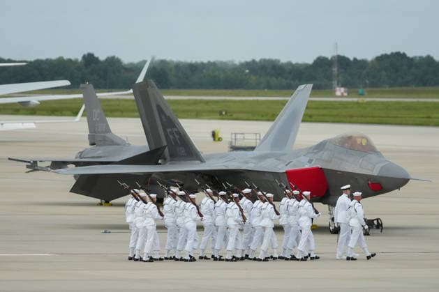 Members of the US Navy walk past an F-22 prior to an arrival ceremony for Chinese President Xi Jinping at Joint Base Andrews, Maryland on Wednesday, Sept. 23, 2026. President Trump is hosting President Xi for a three-day state visit to Washington, DC where the leaders are expected to discuss trade practices, artificial intelligence and tariffs.  WASP20260923113 ALxDRAGO
