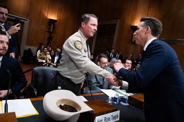 Flock™s Nationwide AI Surveillance Network UNITED STATES - SEPTEMBER 23: Sheriff Ross Teeple, Pinal County, Ariz., greets Sen. Josh Hawley, R-Mo., during the Senate Judiciary Subcommittee on Crime and Counterterrorism hearing titled Always Watching: Flock™s Nationwide AI Surveillance Network, in Dirksen building on Wednesday, September 23, 2026. (Tom Williams CQ Roll Call) Washington DC United States EDITORIAL USE ONLY Copyright: x2026xCQ-RollxCall,xInc.x TomxWilliamsx rollcallpix172902