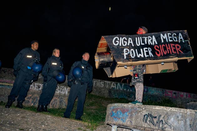 September 23, 2026, Berlin, Berlin, Germany: A small crowd of protestors gathered at Kottbuser Tor and marched until Goerlitzer Park protesting against the use of AI cameras in the areas..Since beginning of September Berlin city government has installed and is under operation a system of AI cameras monitoring the areas of high criminality with a lot of questions open regarding who is able to have access and process the data being collected. Berlin Germany - ZUMAk201 20260923_zip_k201_009 Copyright: xNikosxKanistrasx