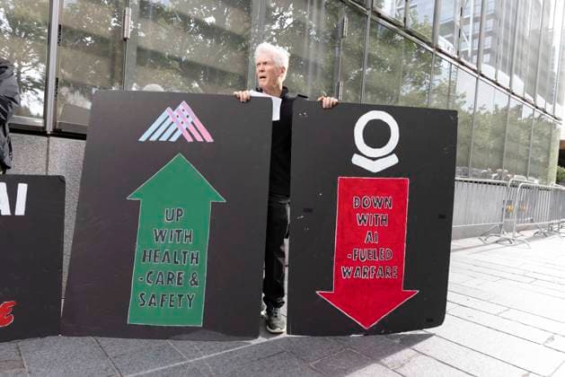 September 23, 2026, New York, New York, USA: ACT UP NY leads a coalition of organizations blockading the entrance to 1 WTC and later blocking traffic on the West Side Highway demonstrating under the banner AI OUT OF OUR HEALTHCARE! PALANTIR OUT OF MOUNT SINAI! as the Newsweek AI Health Summit is held inside the building and a keynote speaker is Dr. Brendan Carr, (not pictured) CEO of Mount Sinai. Approximately 20 protesters are arrested by NYPD. Part of the MONEY FOR AIDS and HEALTHCARE! NOT FOR ICE and WARFARE! ACT UP (AIDS Coalition To Unleash Power) campaign, demonstrators denounce Mount Sinai s contract with Palantir, a surveillance, data analytics and military tech company. Protesters hold signs that read UP WITH HEALTHCARE SAFETY - ZUMAr174 20260923_znp_r174_025 Copyright: xGinaxMxRandazzox