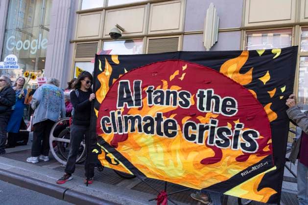 September 23, 2026, New York, New York, USA: A coalition of climate groups hold a family friendly singing demonstration outside GoogleÃ¢â‚¬â ¢s offices in ManhattanÃ¢â‚¬â ¢s Chelsea neighborhood protesting Google for embedding AI in educational tools and building gas powered data centers fueling the climate crisis. People hold a banner that reads AI fans the climate crisis. The event is part of the Unplug AI Week of Action during Climate Week NYC. Organizers call for a pause on advanced AI development and data center expansion and a national moratorium on the use of AI in schools. New York USA  - ZUMAr174 20260923_znp_r174_053 Copyright: xGinaxMxRandazzox