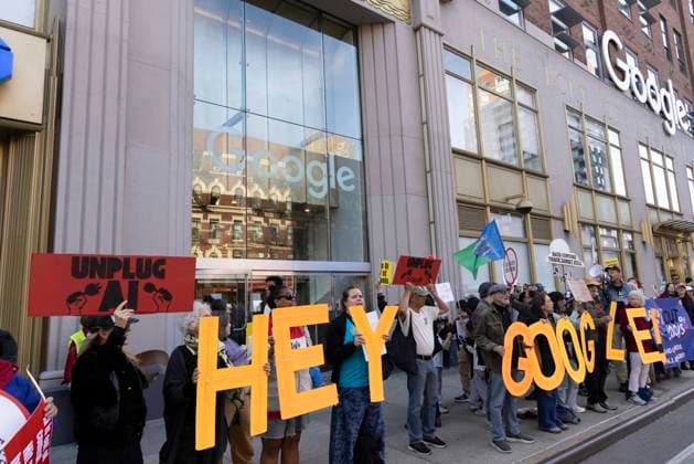 September 23, 2026, New York, New York, USA: A coalition of climate groups hold a family friendly singing demonstration outside GoogleÃ¢â‚¬â ¢s offices in ManhattanÃ¢â‚¬â ¢s Chelsea neighborhood protesting Google for embedding AI in educational tools and building gas powered data centers fueling the climate crisis. People hold signs and letters that read UNPLUG AI HEY GOOGLE. The event is part of the Unplug AI Week of Action during Climate Week NYC. Organizers call for a pause on advanced AI development and data center expansion and a national moratorium on the use of AI in schools. New York USA - ZUMAr174 20260923_znp_r174_063 Copyright: xGinaxMxRandazzox