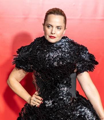 September 23, 2026, Bronx, New York, USA: Mena Suvari wearing dress by Christian Siriano attends premiere American Horror Story: 13 by FX Hulu at The Hotel Chelsea in New York, NY on September 23, 2026. Bronx USA  - ZUMAr339 20260923_znp_r339_112 Copyright: xLevxRadinx