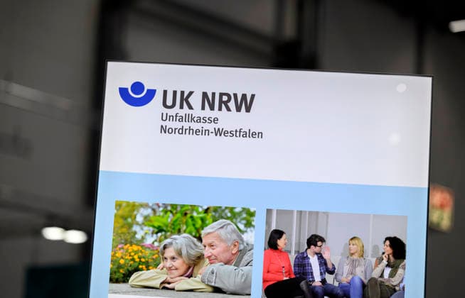 Lettering, UK NRW logo, Unfallkasse REHACARE Trade Fair for Rehabilitation and Care, September 23–26, 2026, in Düsseldorf, Germany, at the trade fair grounds