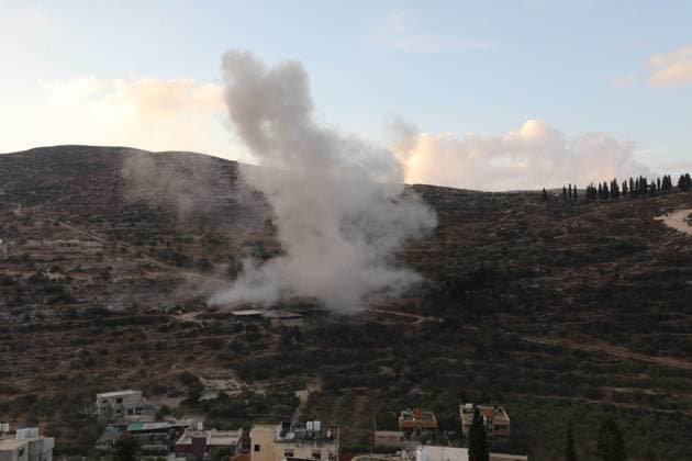 Israeli forces blow up Palestinian prisoner™s home near Nablus BEIT IMRIN, NABLUS, OCCUPIED WEST BANK, SEPTEMBER 24, 2026: Smoke rises after Israeli forces blew up the family home of Palestinian prisoner Dawas Hassoun in the village of Beit Imrin, northwest of Nablus. Israeli authorities accuse Hassoun, who has been detained since March, of carrying out a vehicle-ramming attack on March 21 that killed Israeli settler Yehuda Sherman. Residents were ordered to evacuate the house before the demolition, which also caused damage to neighboring property, according to local sources. NABLUS Palestine, State of Copyright: x xNedalxShtiehx xJNAxPressx