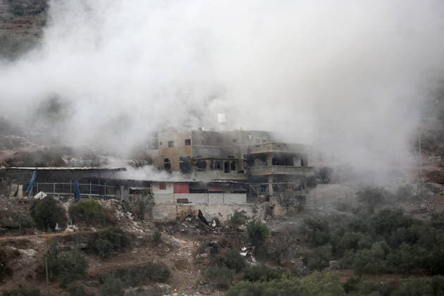 September 24, 2026, Nablus, West Bank, Palestine: Smoke rises as Israeli forces demolish the home of Palestinian prisoner Dawas Hassouna. Israeli army forces demolished the family home of Palestinian prisoner Dawas Hassoun, who is accused of killing an Israeli settler, in the village of Beit Marin, northwest of Nablus in the West Bank. Nablus Palestine  - ZUMAs197 20260924_aaa_s197_026 Copyright: xNasserxIshtayehx