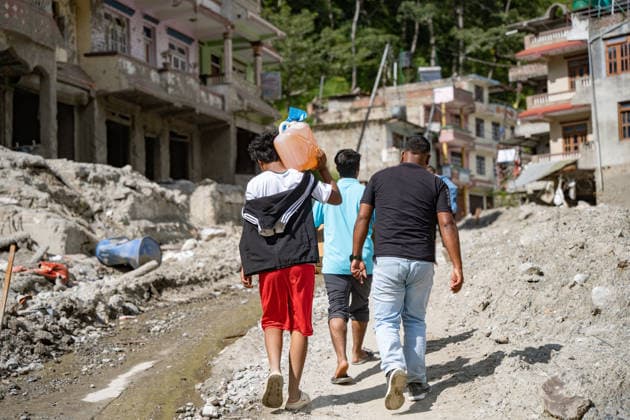 September 24, 2026, Rasuwa, Bagmati, Nepal: People in the flood-affected area of Ã¢â‚¬¹Ã¢â‚¬¹Syaphrubesi, Rasuwa, are carrying petrol in plastic containers. Residents of Syaphrubesi are facing difficulties after the flood washed away the bridge. Rasuwa Nepal  - ZUMAa308 20260924_znp_a308_018 Copyright: xChandraxBahadurxAlex