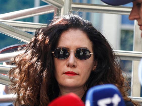 September 24, 2026, Tirana, Tirana, Albania: Vlora Hyseni, former head of Albania s intelligence service, leaves offices of SPAK (Special Anticorruption Prosekutor) after a judge ordered her under house arrest on suspicion of disclosing classified information to unauthorized persons. Tirana Albania  - ZUMAb266 20260924_zip_b266_001 Copyright: xArmandoxBabanix