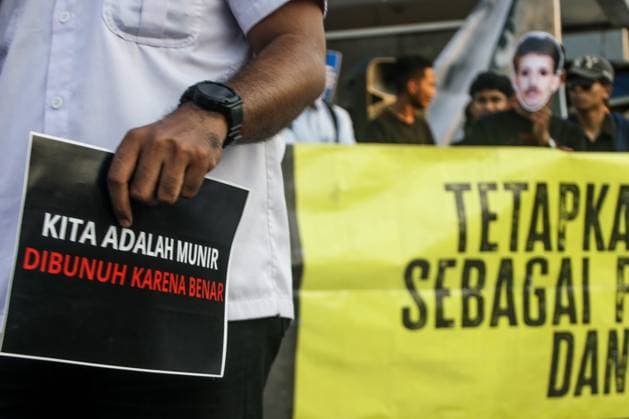 September 24, 2026, Yogyakarta, Indonesia: YOGYAKARTA, INDONESIA, SEPTEMBER 24, 2026: Students and civil society activists take part in the weekly Kamisan protest at Tugu Yogyakarta, commemorating 22 years since the killing of Indonesian human rights activist Munir Said Thalib. Munir died from arsenic poisoning aboard a flight to the Netherlands on September 7, 2004. Participants used the gathering to remember Munir and call for accountability in unresolved human rights cases in Indonesia. Yogyakarta Indonesia  - ZUMAq101 20260924_zna_q101_069 Copyright: xIlhamxNurxArifinx