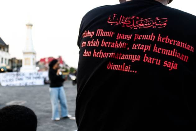 September 24, 2026, Yogyakarta, Indonesia: YOGYAKARTA, INDONESIA, SEPTEMBER 24, 2026: Students and civil society activists take part in the weekly Kamisan protest at Tugu Yogyakarta, commemorating 22 years since the killing of Indonesian human rights activist Munir Said Thalib. Munir died from arsenic poisoning aboard a flight to the Netherlands on September 7, 2004. Participants used the gathering to remember Munir and call for accountability in unresolved human rights cases in Indonesia. Yogyakarta Indonesia  - ZUMAq101 20260924_zna_q101_072 Copyright: xIlhamxNurxArifinx