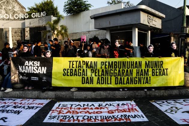 September 24, 2026, Yogyakarta, Indonesia: YOGYAKARTA, INDONESIA, SEPTEMBER 24, 2026: Students and civil society activists take part in the weekly Kamisan protest at Tugu Yogyakarta, commemorating 22 years since the killing of Indonesian human rights activist Munir Said Thalib. Munir died from arsenic poisoning aboard a flight to the Netherlands on September 7, 2004. Participants used the gathering to remember Munir and call for accountability in unresolved human rights cases in Indonesia. Yogyakarta Indonesia  - ZUMAq101 20260924_zna_q101_077 Copyright: xIlhamxNurxArifinx