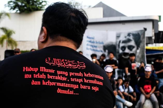 September 24, 2026, Yogyakarta, Indonesia: YOGYAKARTA, INDONESIA, SEPTEMBER 24, 2026: Students and civil society activists take part in the weekly Kamisan protest at Tugu Yogyakarta, commemorating 22 years since the killing of Indonesian human rights activist Munir Said Thalib. Munir died from arsenic poisoning aboard a flight to the Netherlands on September 7, 2004. Participants used the gathering to remember Munir and call for accountability in unresolved human rights cases in Indonesia. Yogyakarta Indonesia  - ZUMAq101 20260924_zna_q101_080 Copyright: xIlhamxNurxArifinx