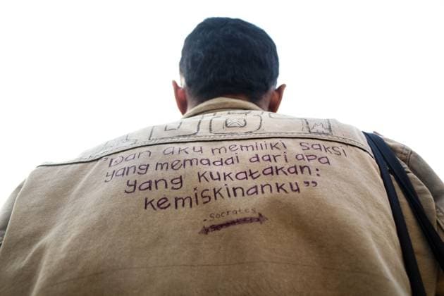 September 24, 2026, Yogyakarta, Indonesia: YOGYAKARTA, INDONESIA, SEPTEMBER 24, 2026: Students and civil society activists take part in the weekly Kamisan protest at Tugu Yogyakarta, commemorating 22 years since the killing of Indonesian human rights activist Munir Said Thalib. Munir died from arsenic poisoning aboard a flight to the Netherlands on September 7, 2004. Participants used the gathering to remember Munir and call for accountability in unresolved human rights cases in Indonesia. Yogyakarta Indonesia  - ZUMAq101 20260924_zna_q101_085 Copyright: xIlhamxNurxArifinx
