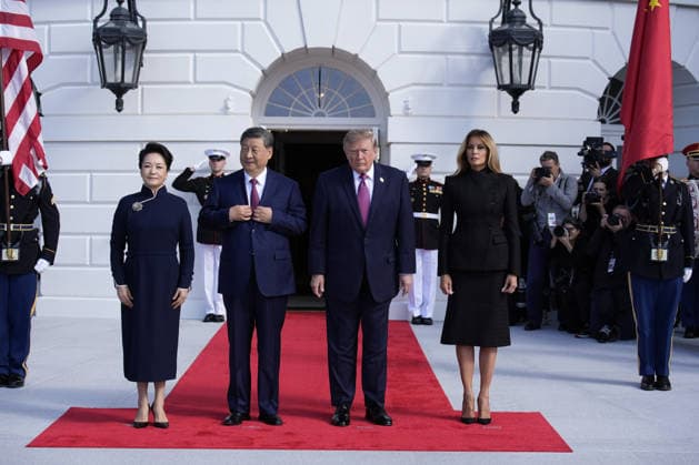 Chinese President Xi Jinping and his wife Peng Liyuan are greeted by President Donald Trump and First Lady Melania Trump as they arrive for a state visit at the White House in Washington DC on Thursday, September 24, 2026. Xi is on a three-day state visit to the U.S. and will hold talks with U.S. officials on tariffs, AI, and other issues.  WAX20260924805 YurixGripas