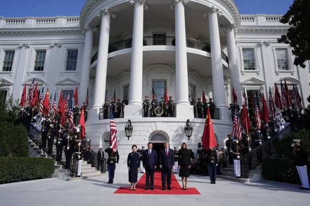 Chinese President Xi Jinping and his wife Peng Liyuan are greeted by President Donald Trump and First Lady Melania Trump as they arrive for a state visit at the White House in Washington DC on Thursday, September 24, 2026. Xi is on a three-day state visit to the U.S. and will hold talks with U.S. officials on tariffs, AI, and other issues.  WAX20260924810 YurixGripas