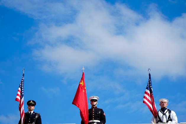 Members of a military honor guard stand at attention as Chinese President Xi Jinping and his wife Peng Liyuan are greeted by President Donald Trump and First Lady Melania Trump as they arrive for a state visit at the White House in Washington DC on Thursday, September 24, 2026. Xi is on a three-day state visit to the U.S. and will hold talks with U.S. officials on tariffs, AI, and other issues.  WAX20260924701 BONNIExCASH
