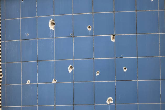 Shrapnel holes dot the exterior cladding of the Consultative and Diagnostic Centre in the Podilskyi district, damaged by an overnight Russian attack, Kyiv, Ukraine, September 24, 2026. On Thursday night, September 24, Russian forces launched a ballistic missile strike on Kyiv, followed by drone assaults on the capital and region. By morning, two people were confirmed killed and eight injured. The attack caused fires and destruction across several districts, damaging medical facilities, apartment blocks, private homes, and vehicles. The maternity hospital in the Podilskyi district sustained damage to windows, doors, and parts of the facade from the first to fifth floors, as well as to windows in the laundry and boiler rooms. Patients, childr  Copyright: xPavloxBahmutx