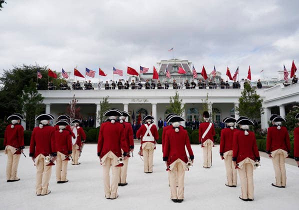 Chinese President Xi Jinping and his wife Peng Liyuan, President Donald Trump and First Lady Melania Trump watch as the fife and drum corps of the 3rd United States Infantry Regiment passes in review during a state visit welcoming ceremony at the White House in Washington DC on Thursday, September 24, 2026. Xi is on a three-day state visit to the U.S. and will hold talks with U.S. officials on tariffs, AI, and other issues.  WAP20260924712 BONNIExCASH