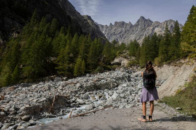 Vehicles Evacuated by Helicopter After Floods - France A woman looks across the rocky channel carved through the RD204T by the flood. Nine vehicles stranded at the Pre de Madame Carle were evacuated by helicopter after floods on August 28 destroyed several sections of the RD204T access road. Ailefroide, Vallouise-Pelvoux, Hautes-Alpes, France, September 24, 2026. Photo by Thibaut Durand ABACAPRESS.COM vallouise-pelvoux PROVENCE-ALPES-COTE D AZUR France  Copyright: xDurandxThibaut ABACAx