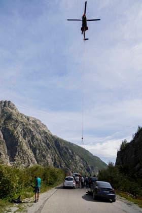 Vehicles Evacuated by Helicopter After Floods - France The helicopter flies above the valley with the lifting frame suspended below. Nine vehicles stranded at the Pre de Madame Carle were evacuated by helicopter after floods on August 28 destroyed several sections of the RD204T access road. Ailefroide, Vallouise-Pelvoux, Hautes-Alpes, France, September 24, 2026. Photo by Thibaut Durand ABACAPRESS.COM vallouise-pelvoux PROVENCE-ALPES-COTE D AZUR France  Copyright: xDurandxThibaut ABACAx